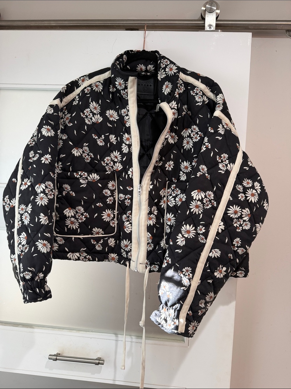 Blank NYC Black Quilted Daisy-Print Crop Puffer with Cream Trim